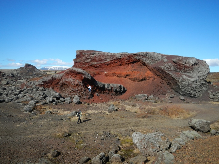 The Rauðhólar ("Red Hills") in the Elliðaárhraun lava fields.  Note the humans for scale!