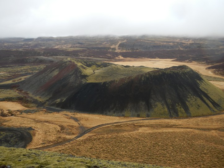 You don't have to look far to find a cinder cone on the Icelandic landscape.