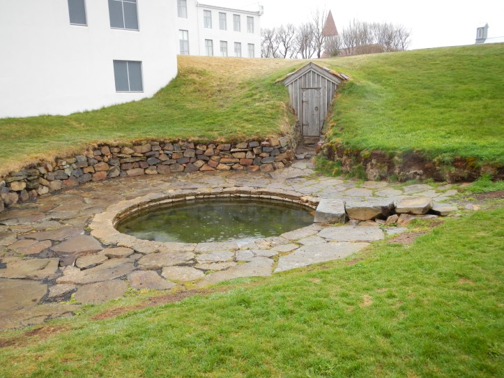 The scene of the crime and the end of Snorri.  The wooden doorway leads to an underground tunnel that Snorri had built so he could walk from his house to the hot spring indoors, spending as little time outdoors in the cold as possible.