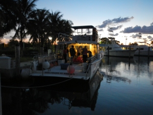 Loading up our boat to head out in the early morning to search for sharks!