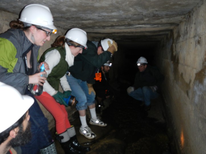 Not much room to stand up - which only put us closer to the granite outcrop that most of us were standing on.