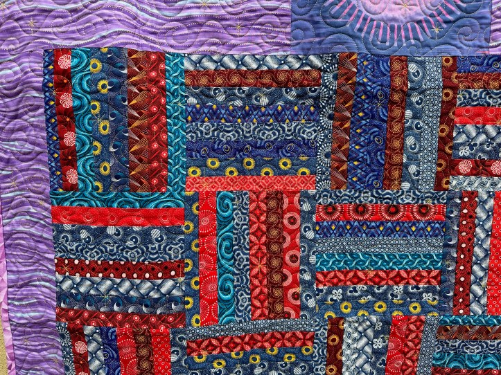 Close-up of blue and red fabrics