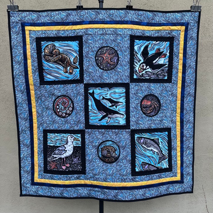 hanging quilt with marine animals/birds and ocean wave fabric