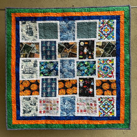 Hanging quilt with patterned fabric in a woven template